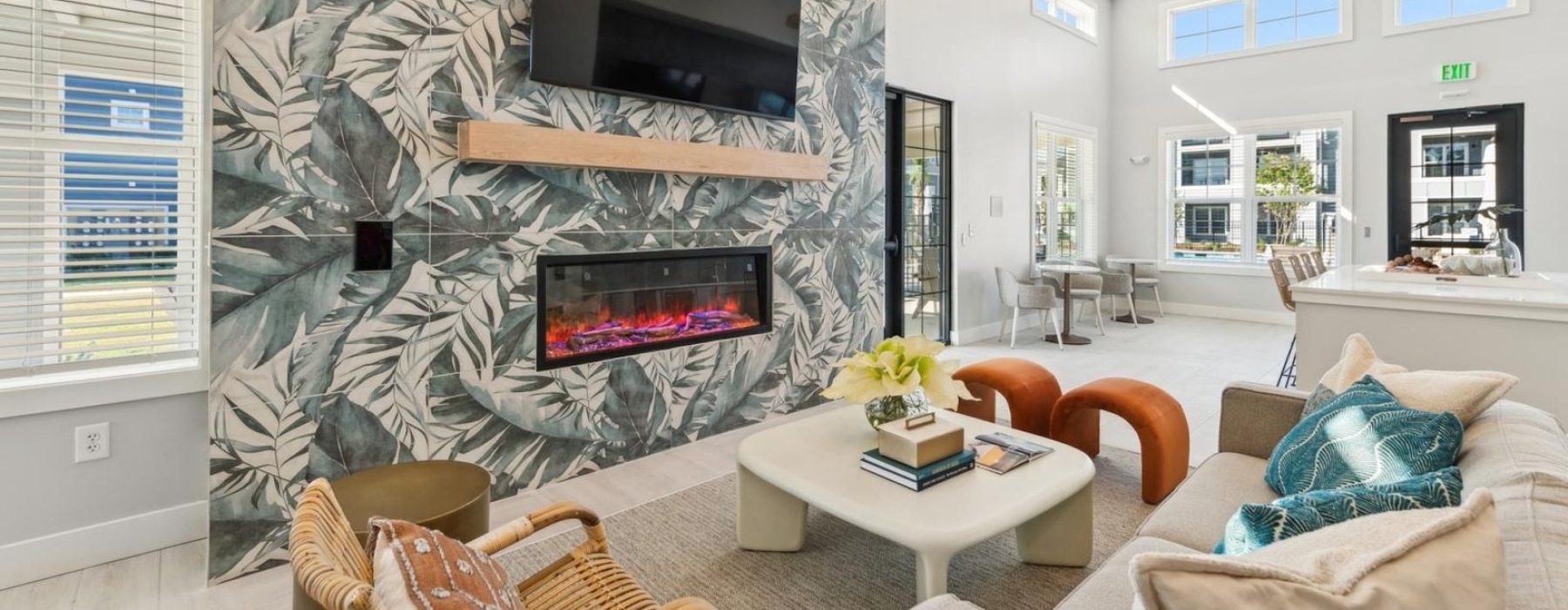 a resident lounge with a fireplace