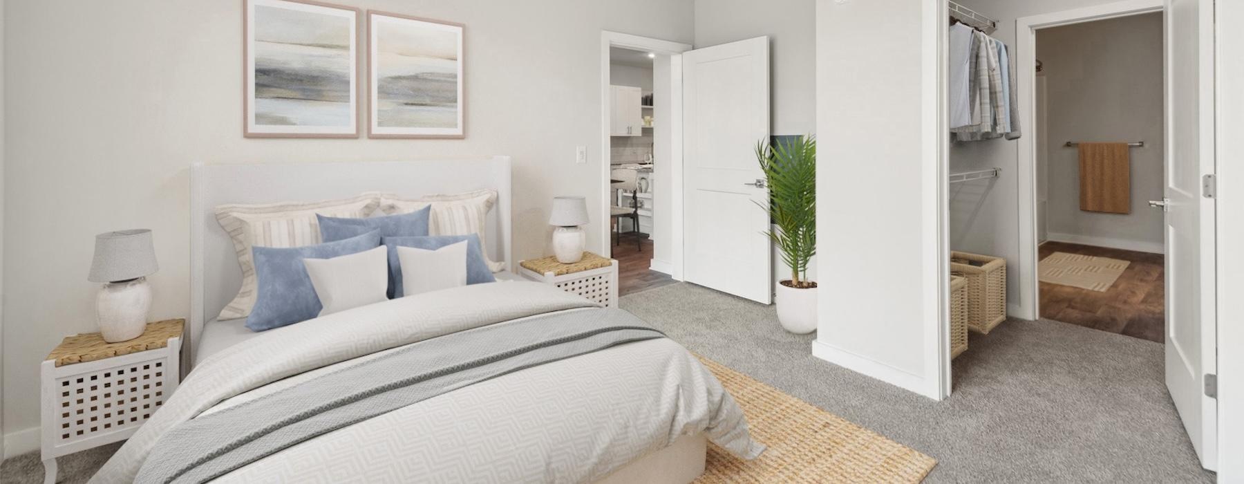 a bedroom with a bed and a fan