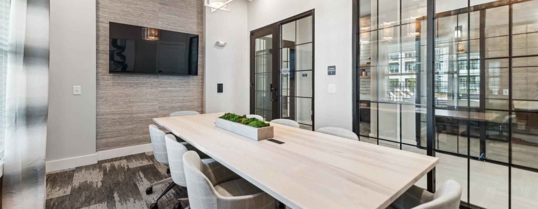 a room with a table and chairs